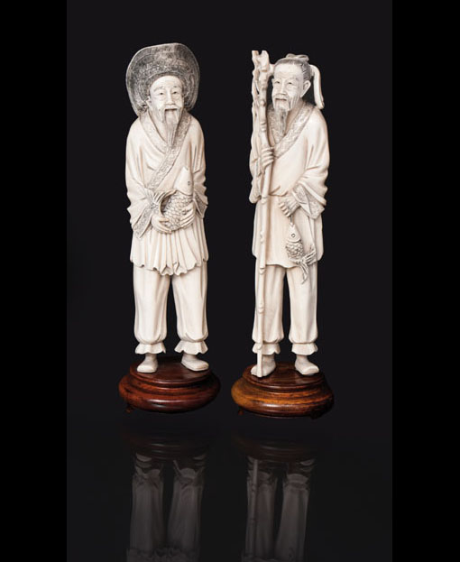 A pair of ivory figure 'Fishermen'