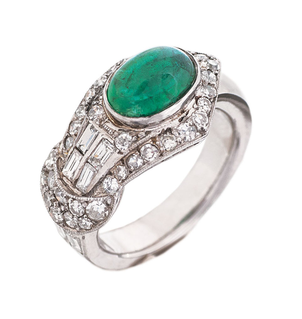 An emerald diamond ring