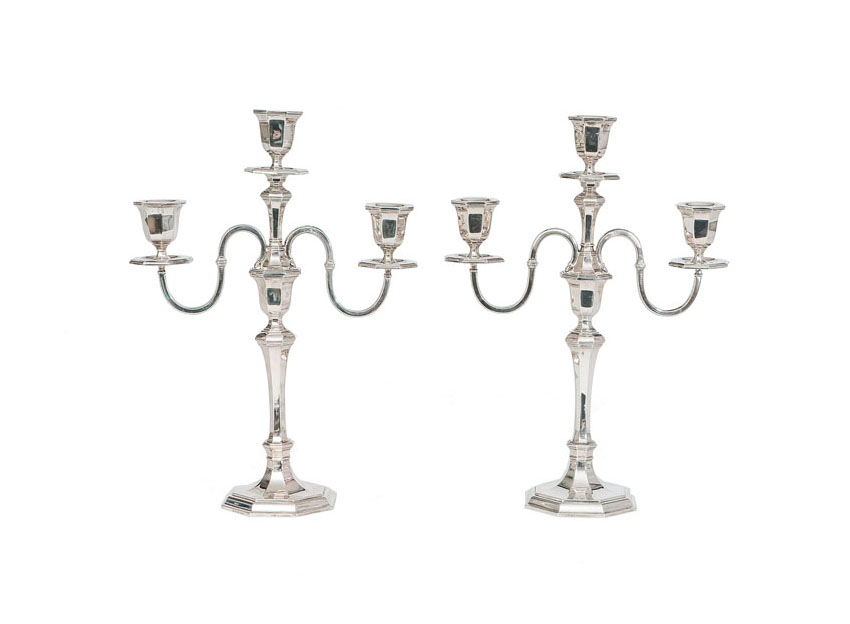 A pair of candlesticks of Baroque style