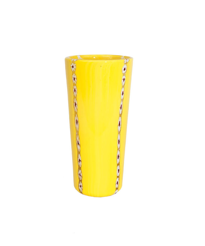 A glass vase a canna