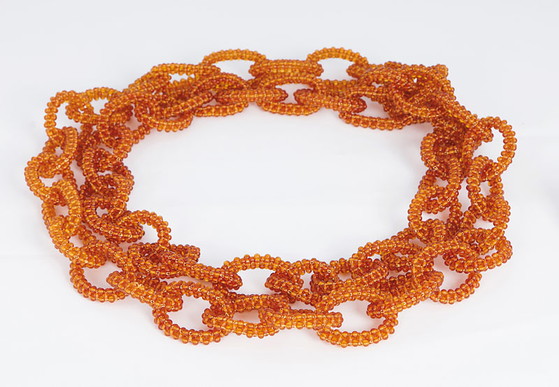 A very long, modern amber necklace