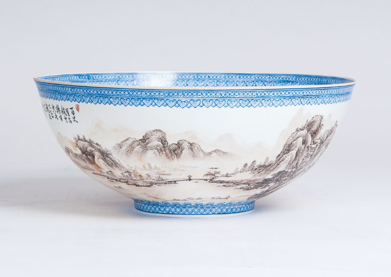 A large bowl with landscape painting
