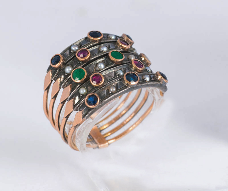 A ring with precious stones