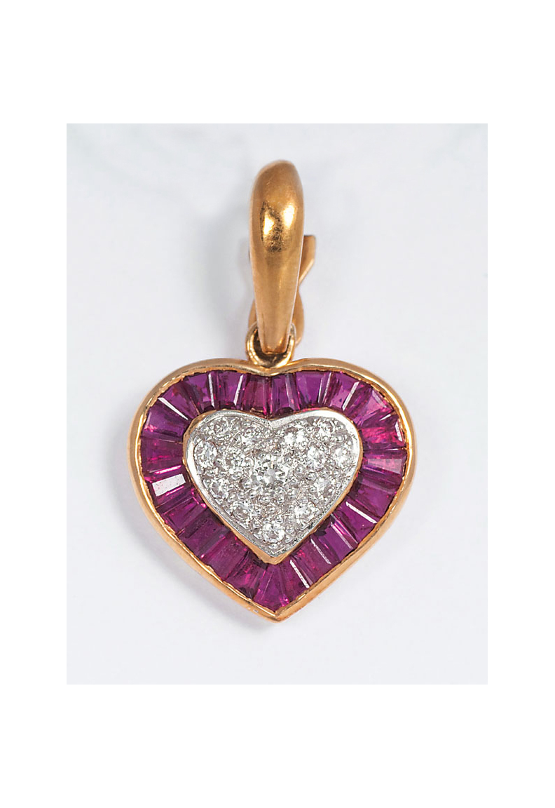 A ruby diamond pendant in heart shape