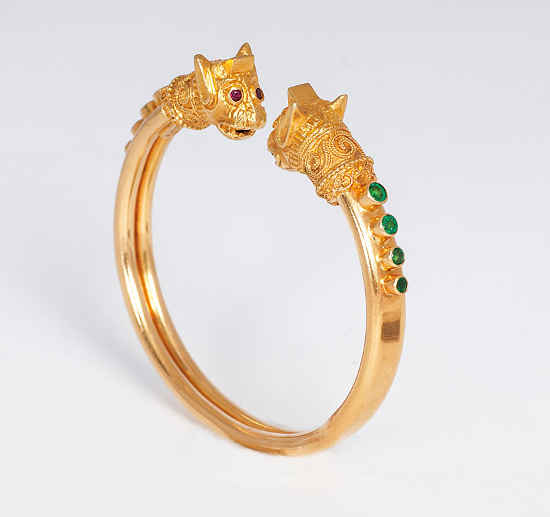 A gold bangle bracelet in antique style