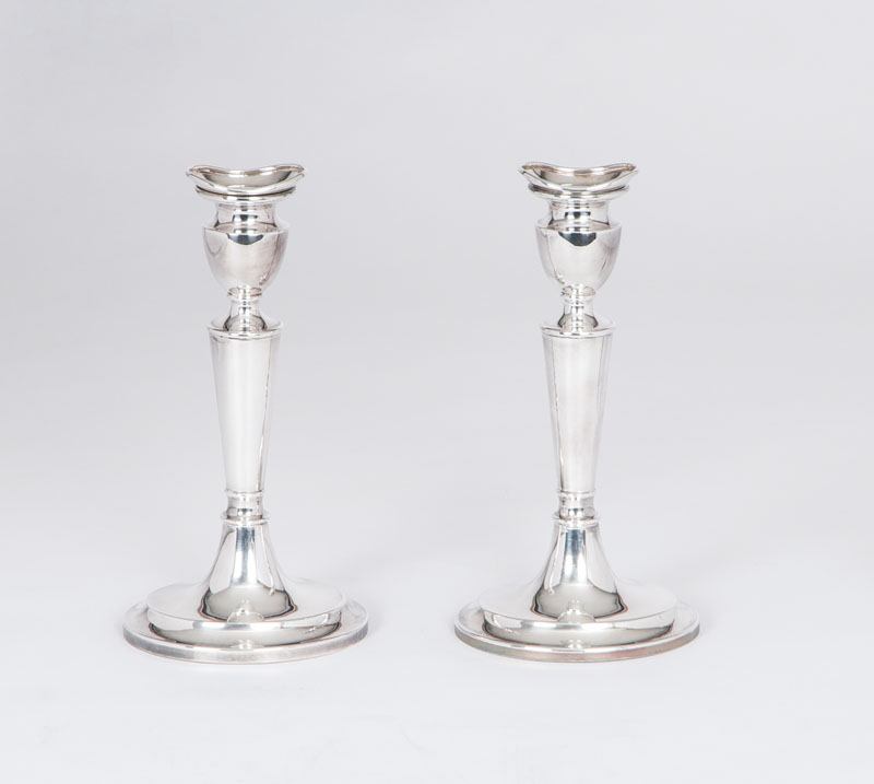 A pair of modern candlesticks