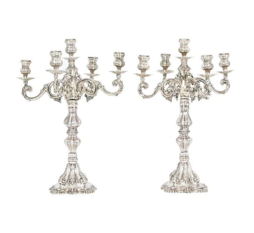 A pair of opulent candelabras of Rococo style