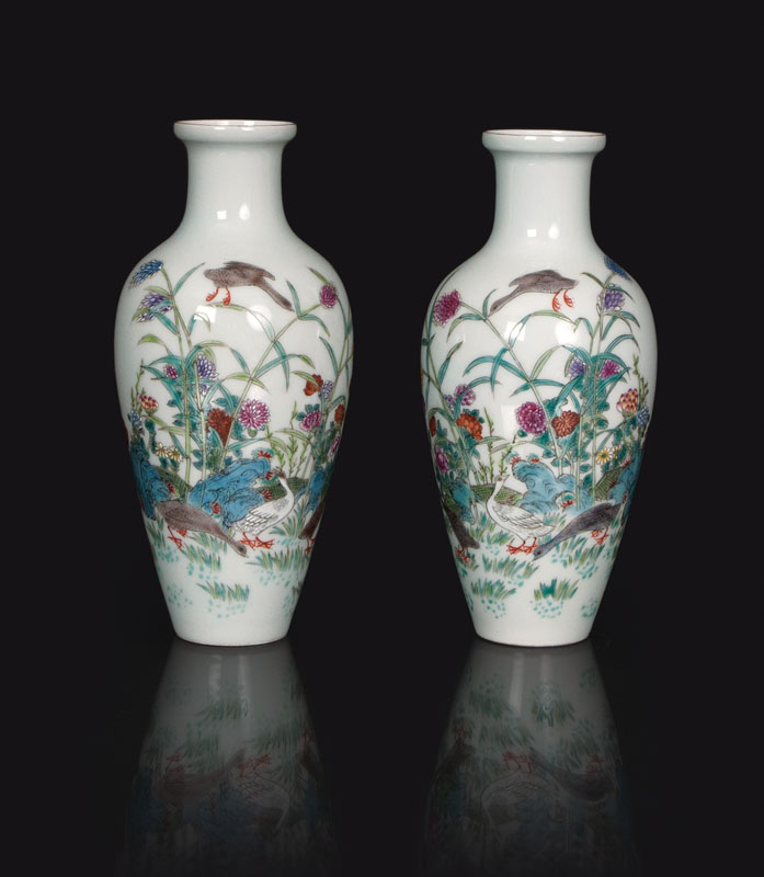 A pair of baluster vases with geese