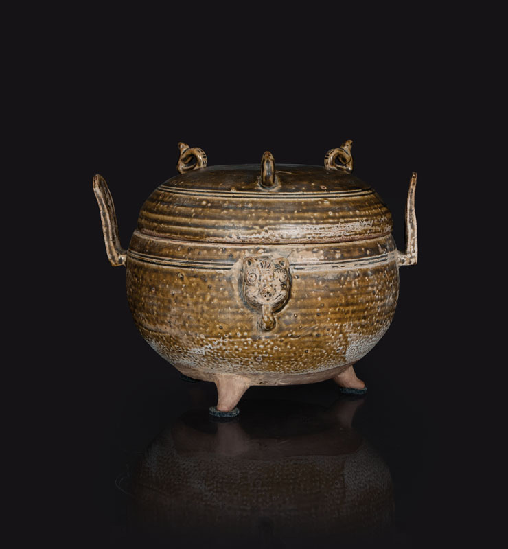 A rare ceramic vessel in the shape of an archaic bronze