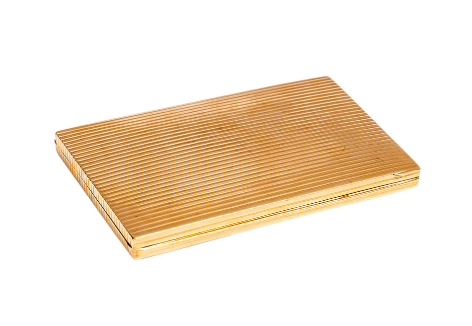 A gold cigarette case of Dunhill