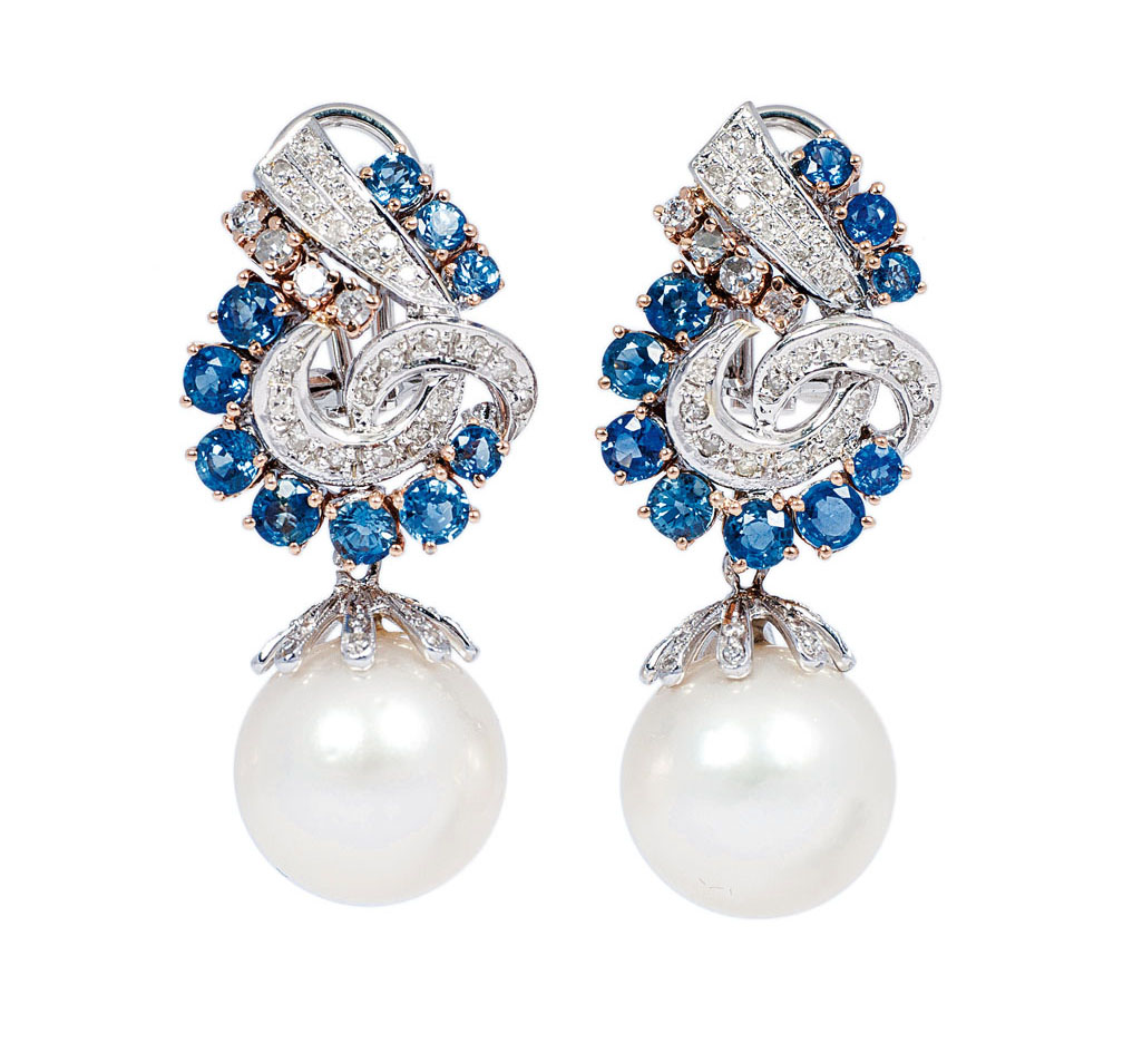 A pair of Southsea pearl earrings with sapphires and diamonds
