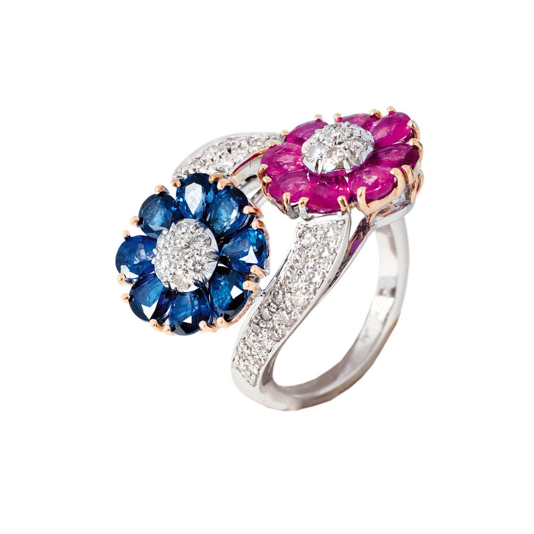 A flowershaped sapphire ruby diamond ring