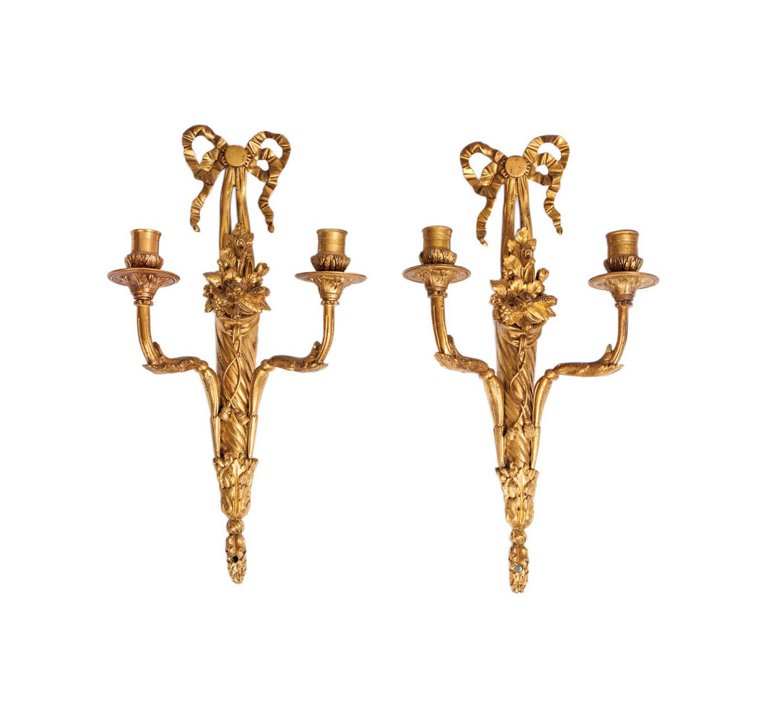 A pair of gilded Empire walllights