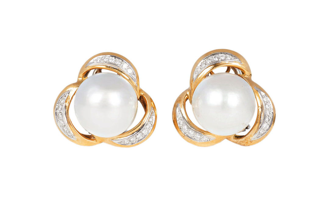 A pair of mabé pearl diamond earrings