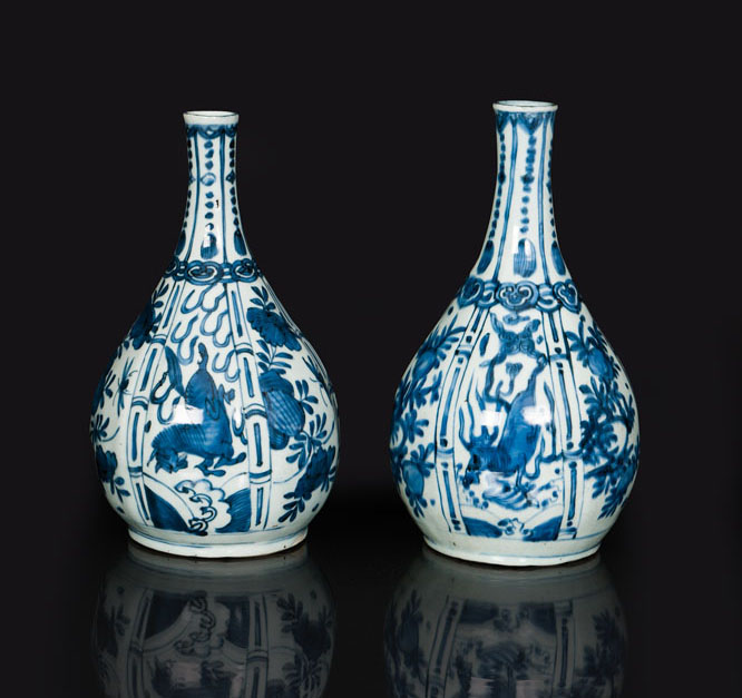 A pair of bottle vases with flying horses