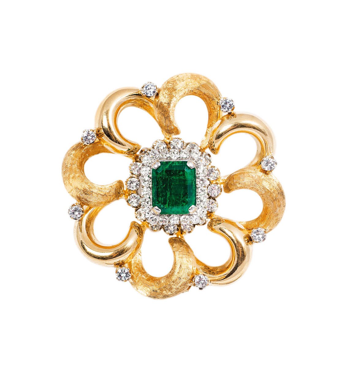 An emerald brooch