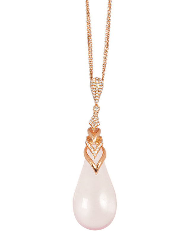 A rose quartz diamond pendant with necklace