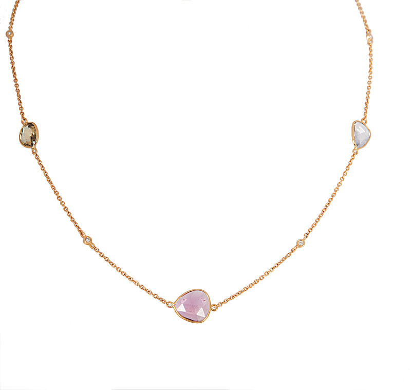 A petite necklace with colourful sapphires