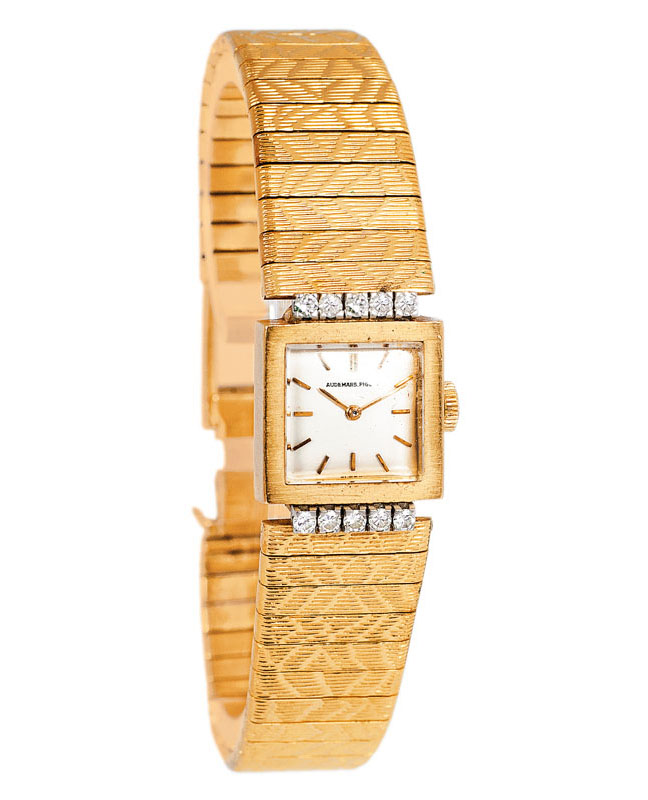 A lady's wrist watch by Audemars Piguet with diamonds
