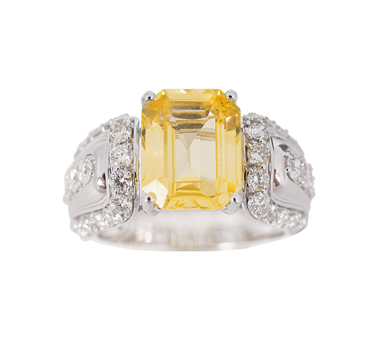 A yellow sapphire diamond ring