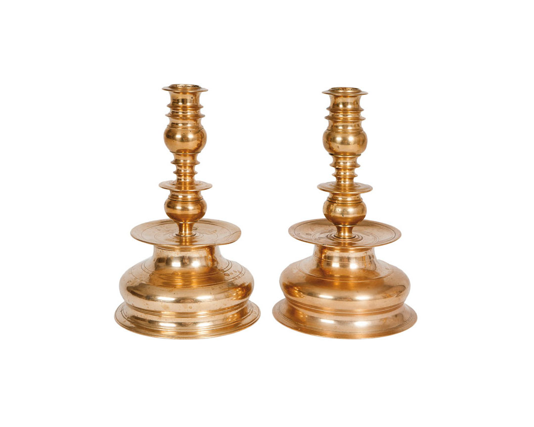 A pair of baroque candlesticks