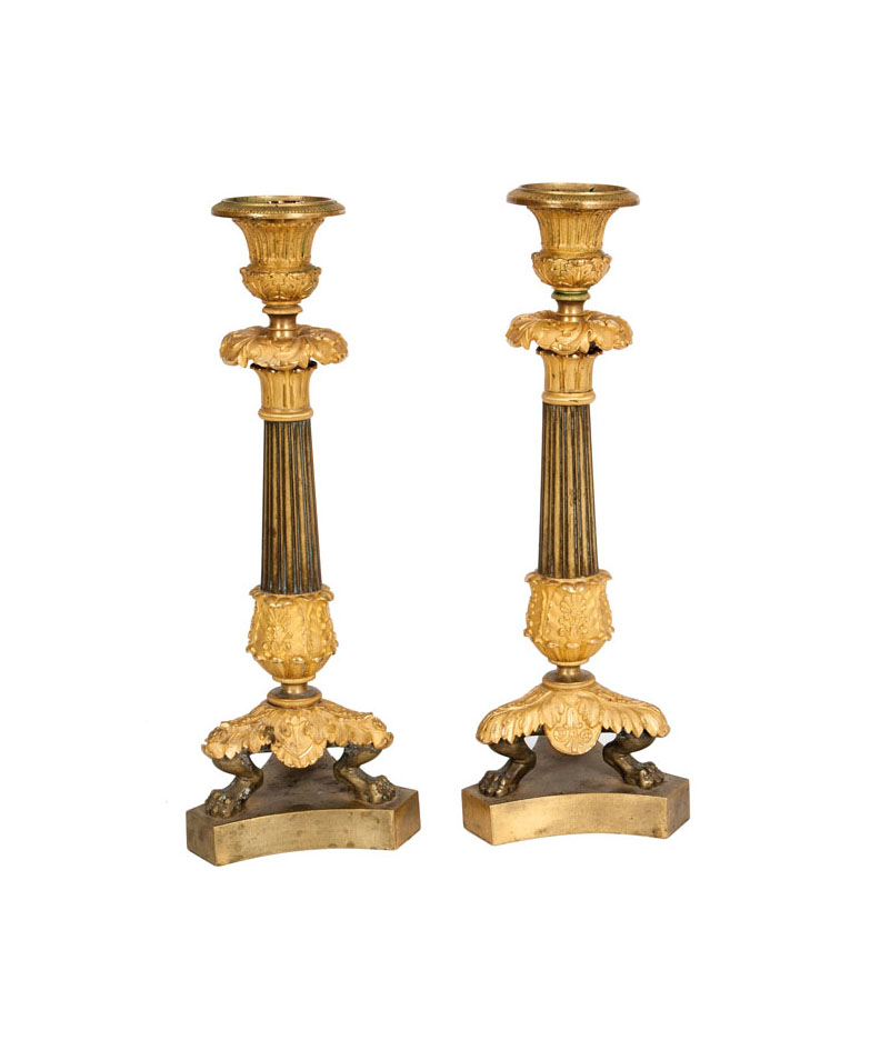A pair of gild-bronze Charles X candlesticks