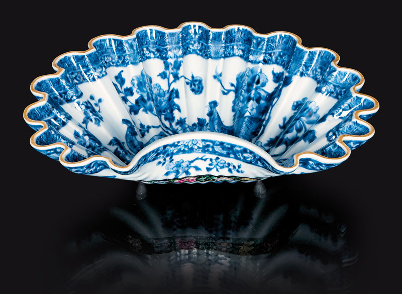 An exceptional shell-bowl with roosters