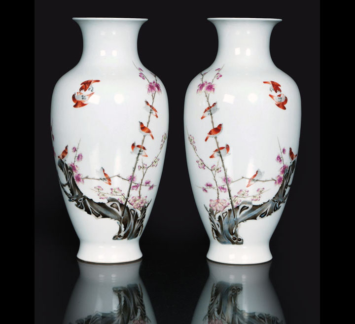 A pair of vases with fine painting of birds