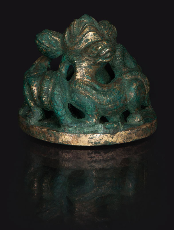 A rare archaic-style weight with qilong-dragons