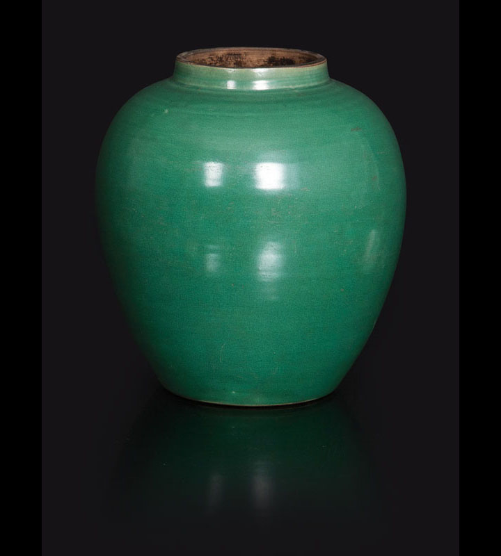 A small jar with emerald green glaze