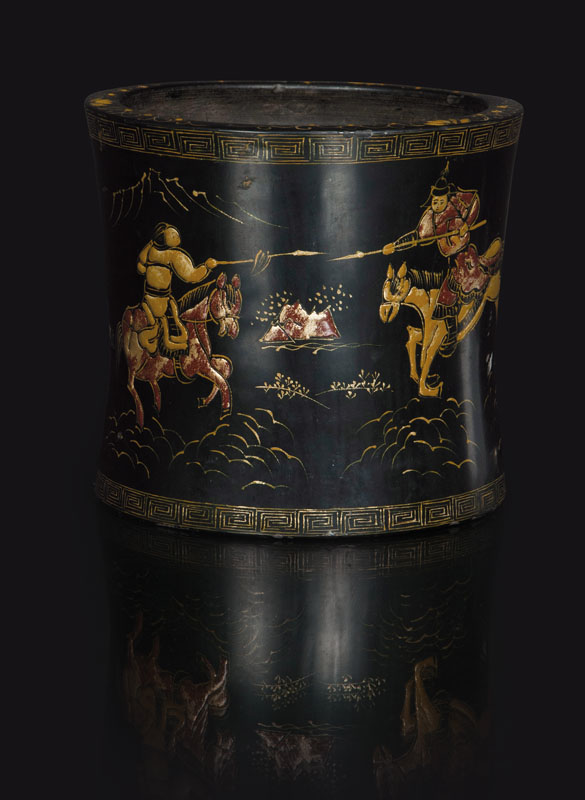 A laquered ceramic brushpot with warriors