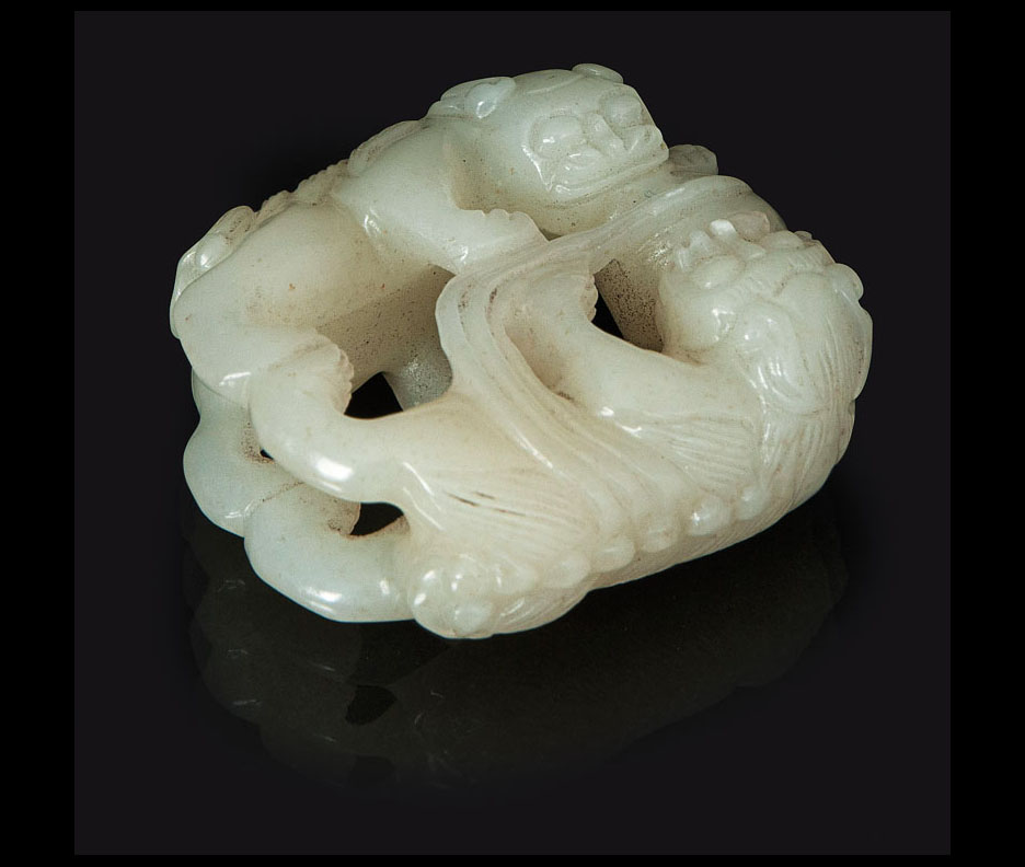 A jade-carving 'Fô-dogs with a brocade ball'