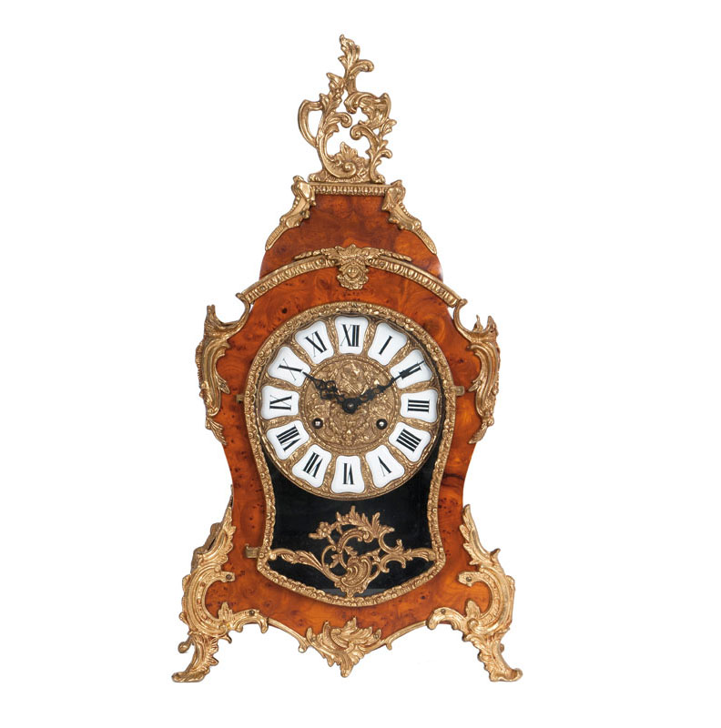 A decorative mantle clock in Louis-Seize style