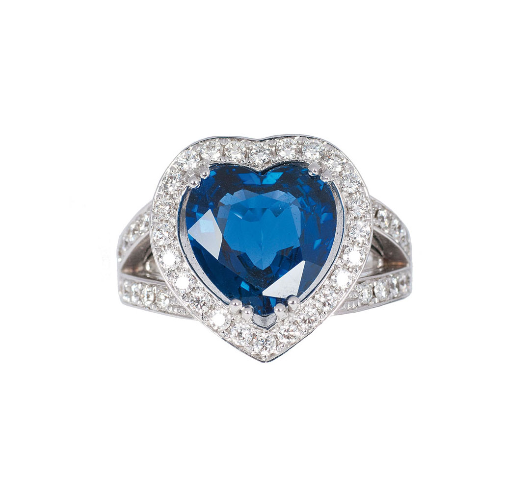 A heartshaped sapphire diamond ring