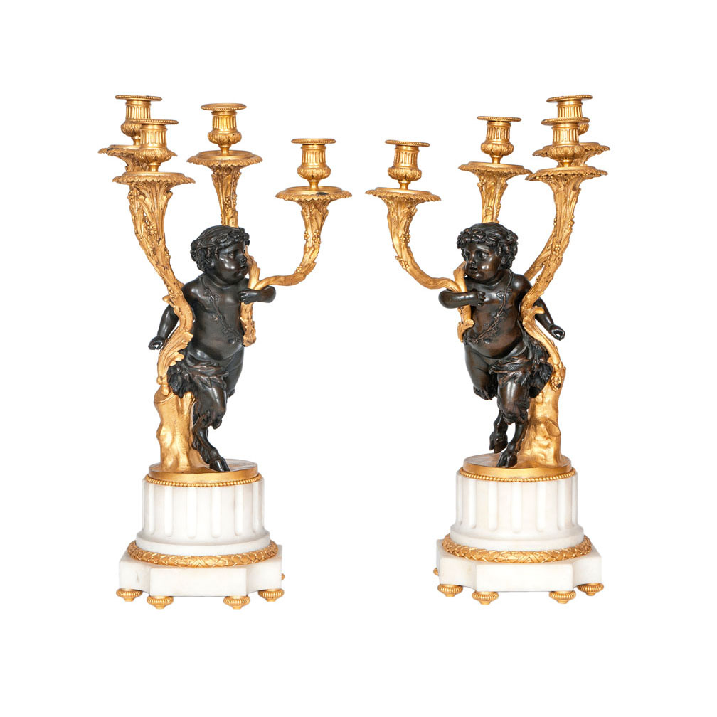 A pair of opulent Napoleon III candelabra