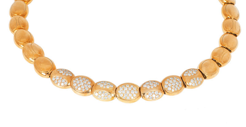 A golden diamond necklace by Mauboussin 'Aime'