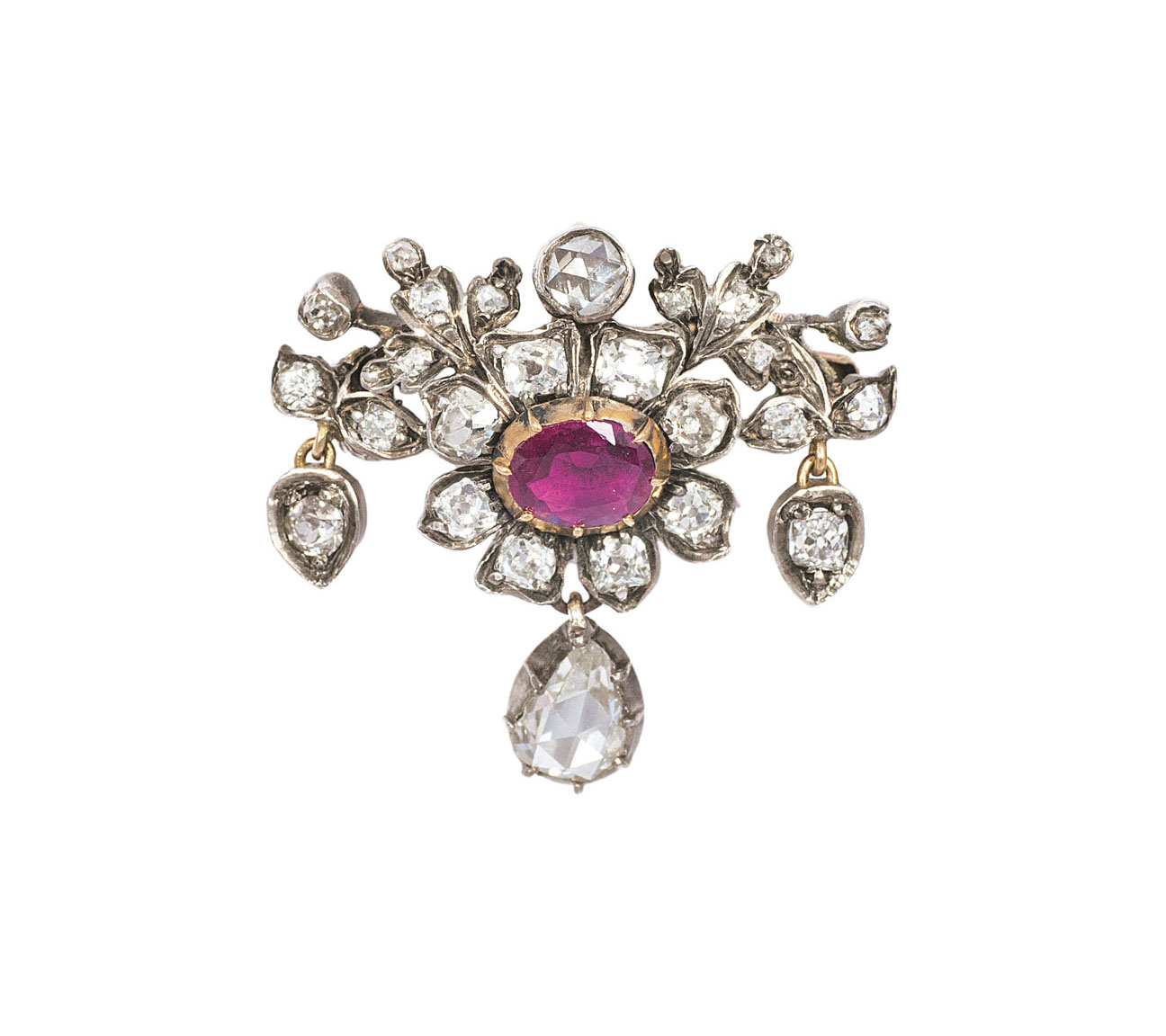 A small, antique diamond ruby brooch