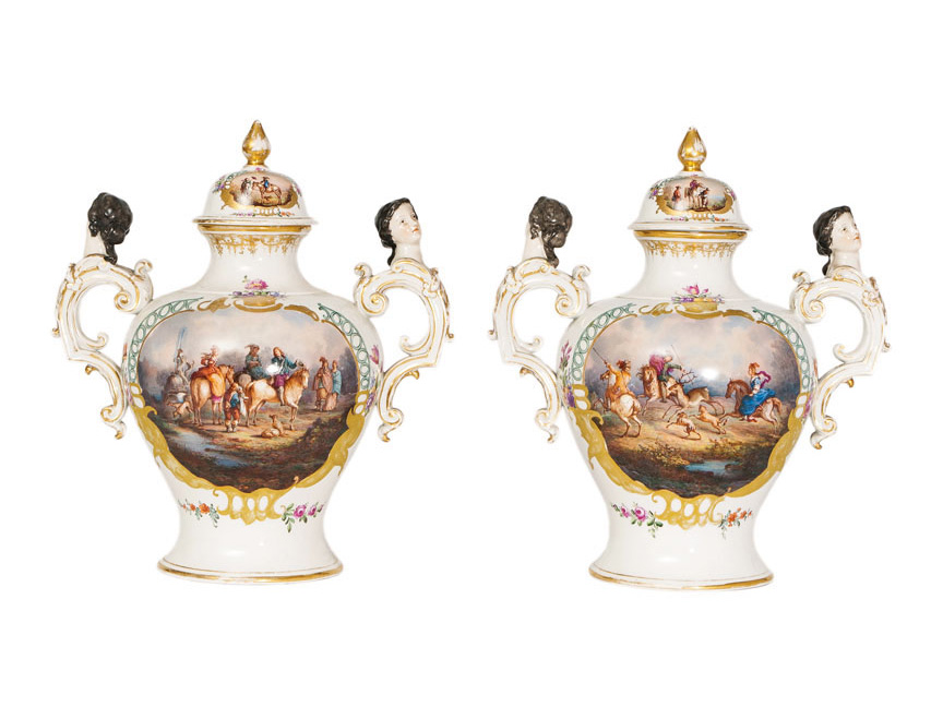 A pair of rare cover vases with hunting scenes and plastical handles
