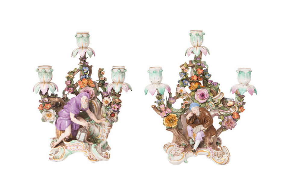 An unusual pair of rare candelabra with Diogenes and an Alchemist