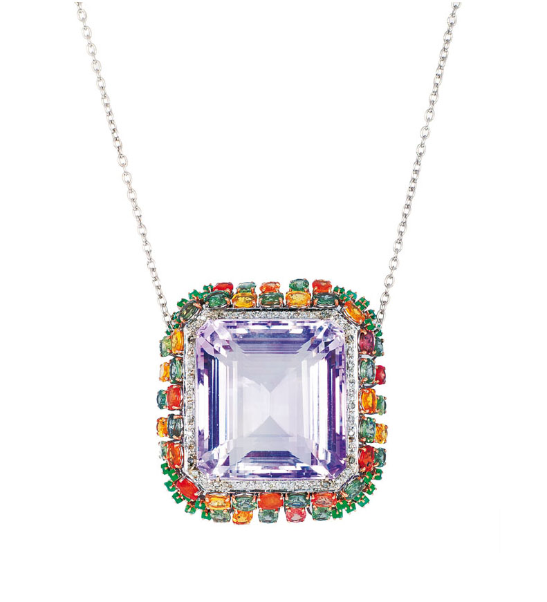 A large, colourful amethyst sapphire pendant with necklace