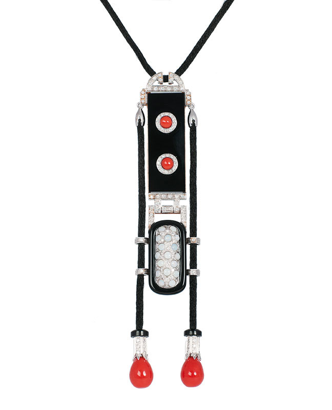 An onyx coral pendant with diamonds in Cartier style