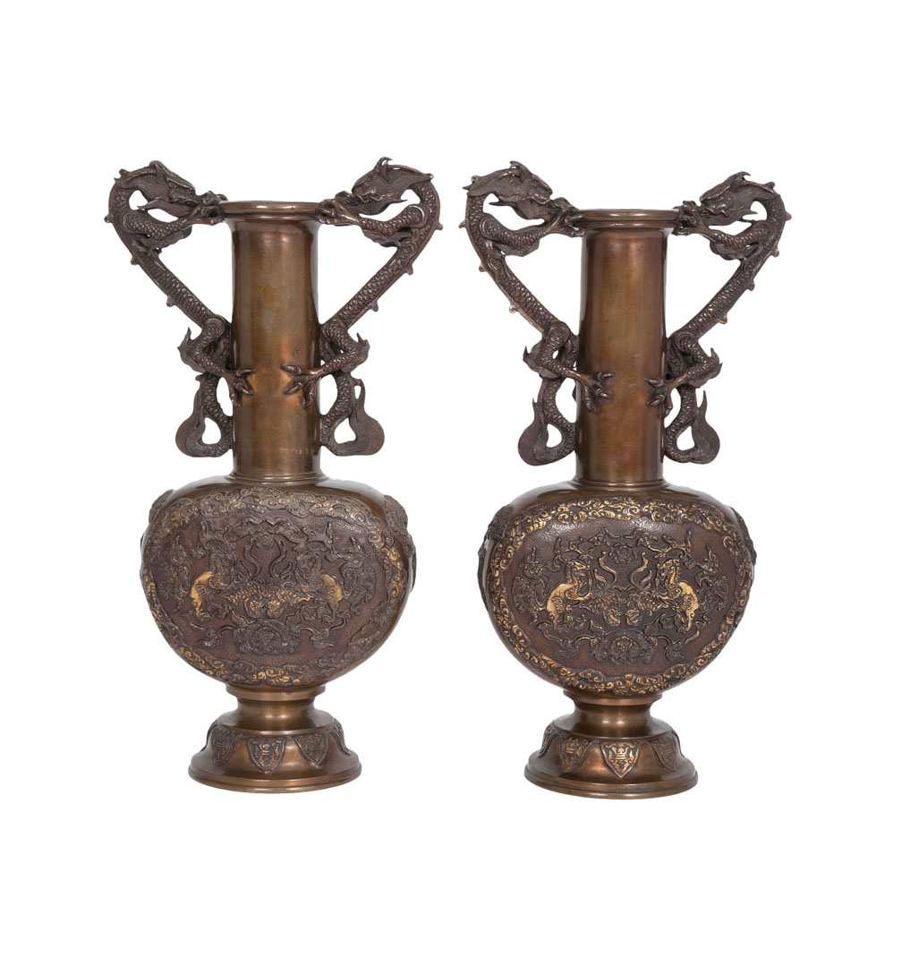 A pair of bronze vases with dragon-handles