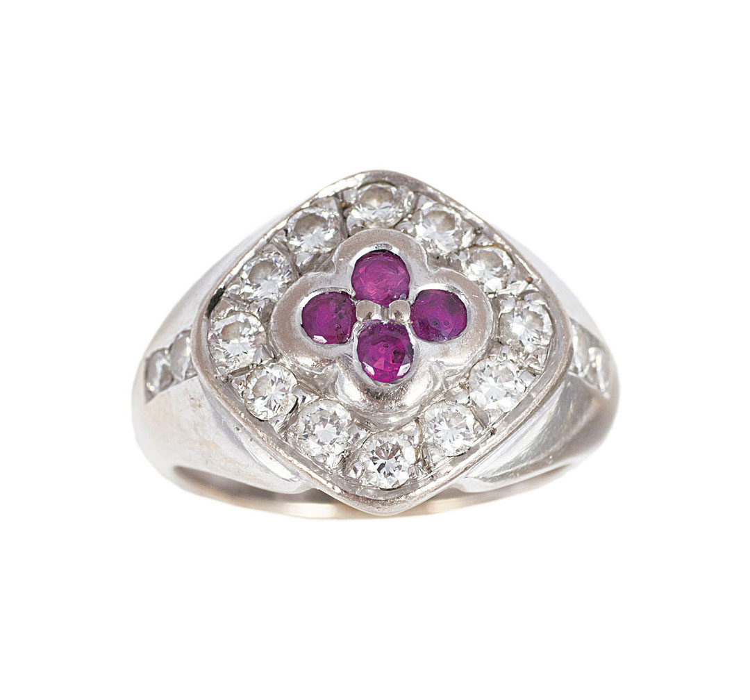 A petite ruby diamond ring