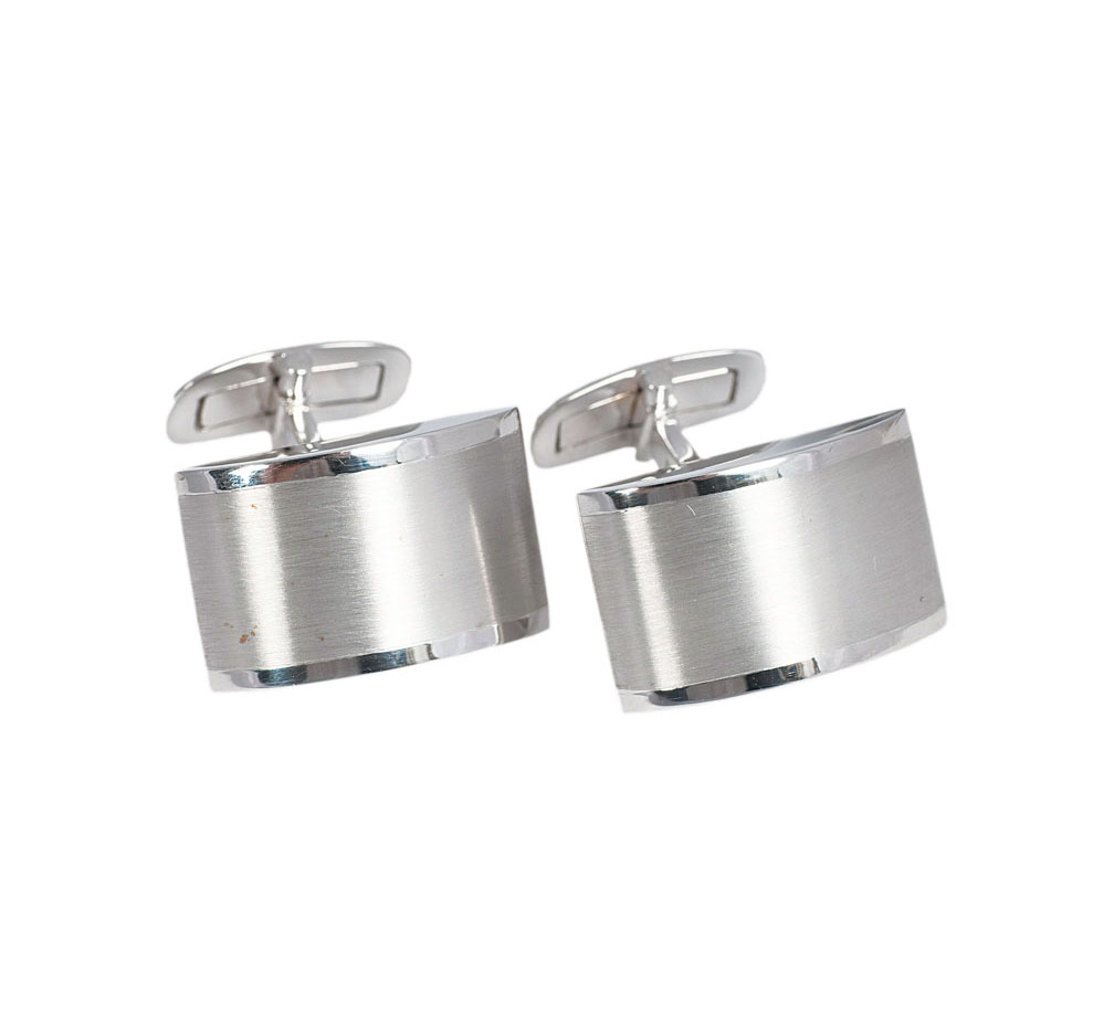 A pair of golden cuff links by Wempe
