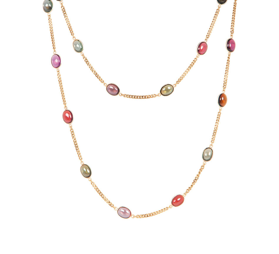 A long golden necklace with tourmalines