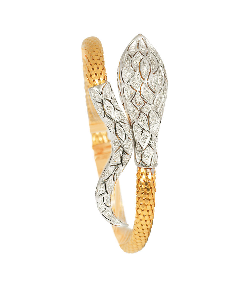 A golden bracelet 'Snake' with diamonds