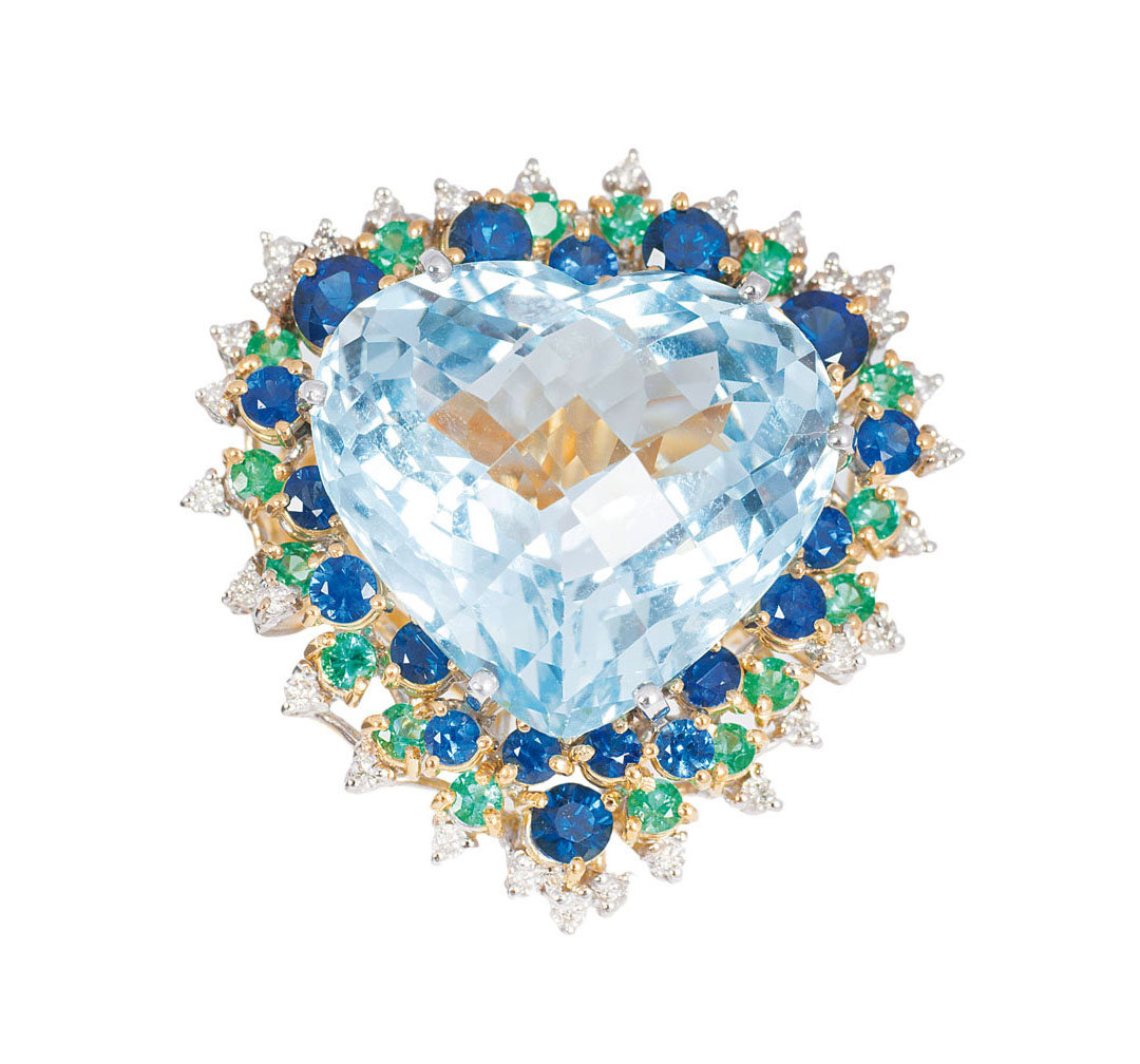 A heartshaped aquamarine sapphire emerald cocktail ring