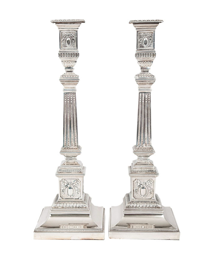 A pair of candlesticks of column-shape