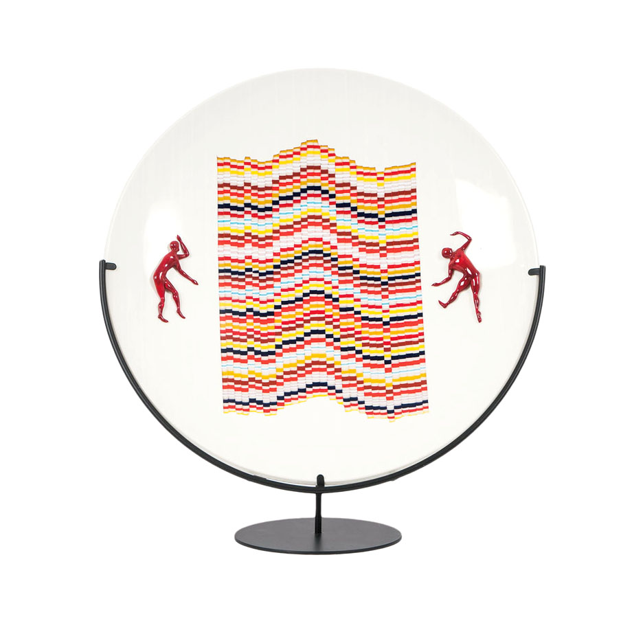 A modern glass plate with dancing figures