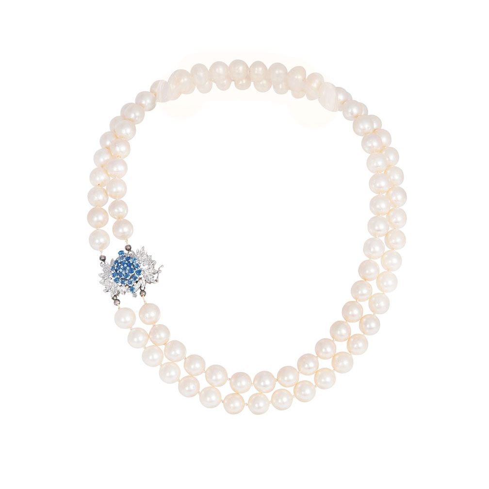 A pearl necklace with sapphire clasp